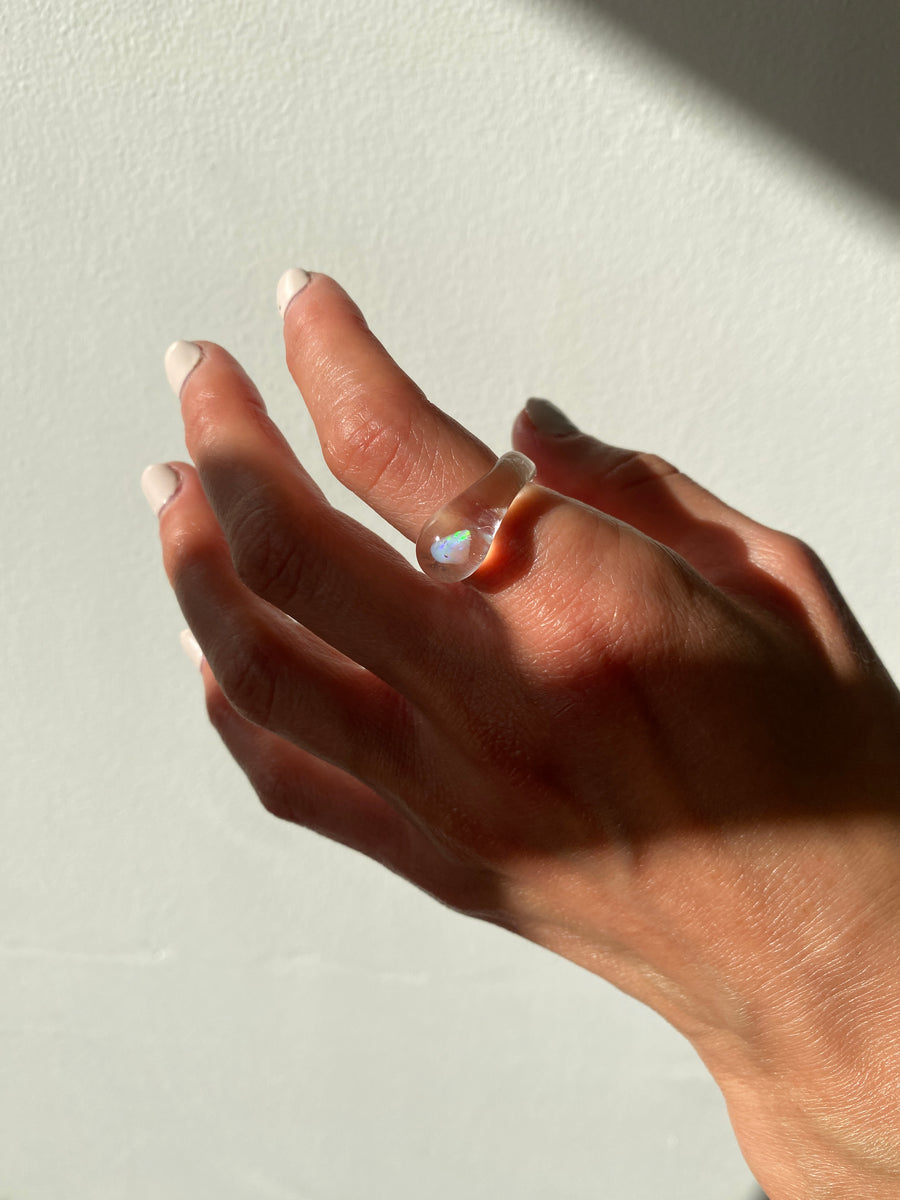 Medea’s - hand blown glass ring with Opal in clear