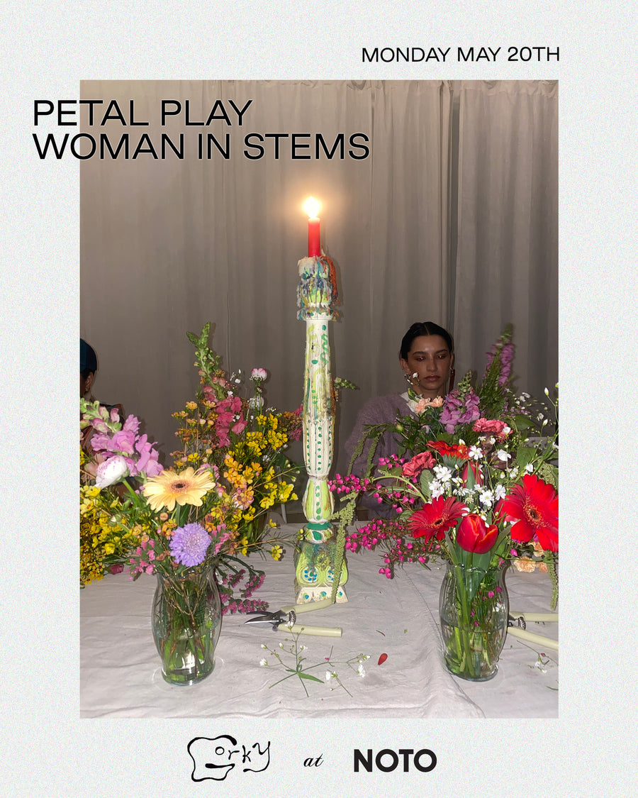 PETAL PLAY WITH WOMAN IN STEMS